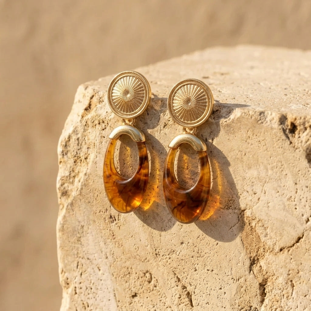TERRA earrings with gold-tone round tops and amber teardrop dangles